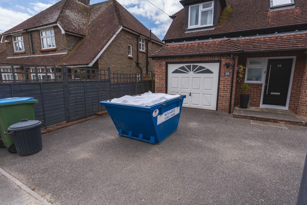 skip outside a house - SCS Waste